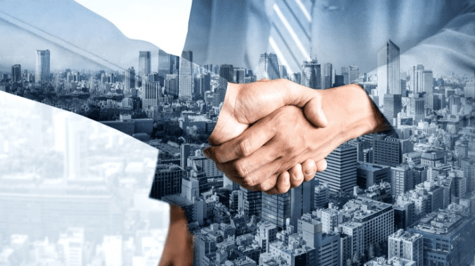 Professional handshake representing a business merger and acquisition transaction Professional handshake representing a business merger and acquisition transaction.